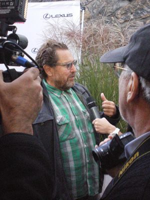 Julian Schnabel answering questions to a throng of people before the screening of his film <em>Miral</em>.