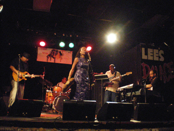 Martha Redbone “kicking it” during <em>The Beat Party</em> on Saturday night.